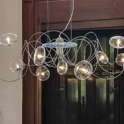 Lampada a sospensione con bracci cromati e paralumi in cristallo Oktopus di Cattelan Italia