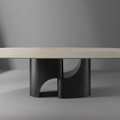 Tavolo Taijitu con piano in marmo e base in metallo di Bonaldo